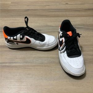 Orange and Black Nike Air 6y